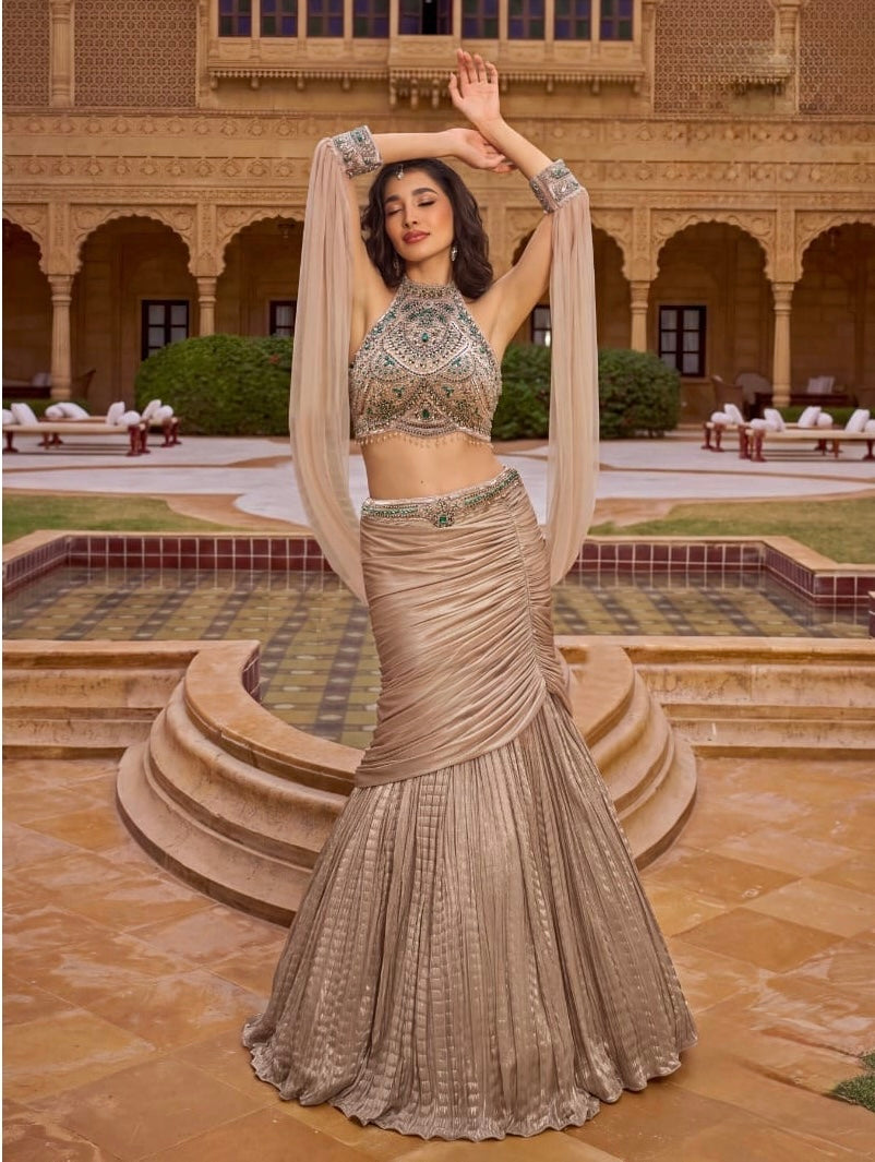 Mocha Gold Mermaid Lehenga Set with Emerald Embellished Halter Blouse & Sheer Cape
